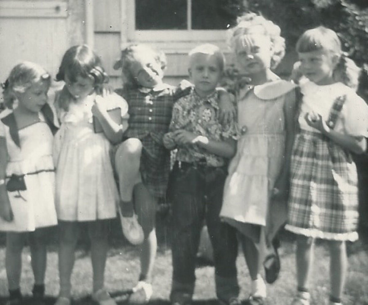 Young author at an all-girl party